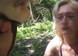 Blonde babe looks great with a big dick in her mouth